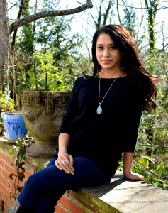 Young female fashion entrepreneur featured in university Management textbook - Lioness Magazine