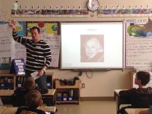 Craig Zamary speaking to elementary school students about entrepreneurship.