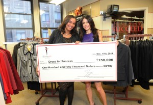 Dress for Success CEO  Joi Gordon accepts the check from Bethenny Frankel on behalf Skinnygirl Cocktails. (Photo by Diane Bondareff/Invision for Skinnygirl Cocktails/AP Images) (PRNewsFoto/Skinnygirl Cocktails)