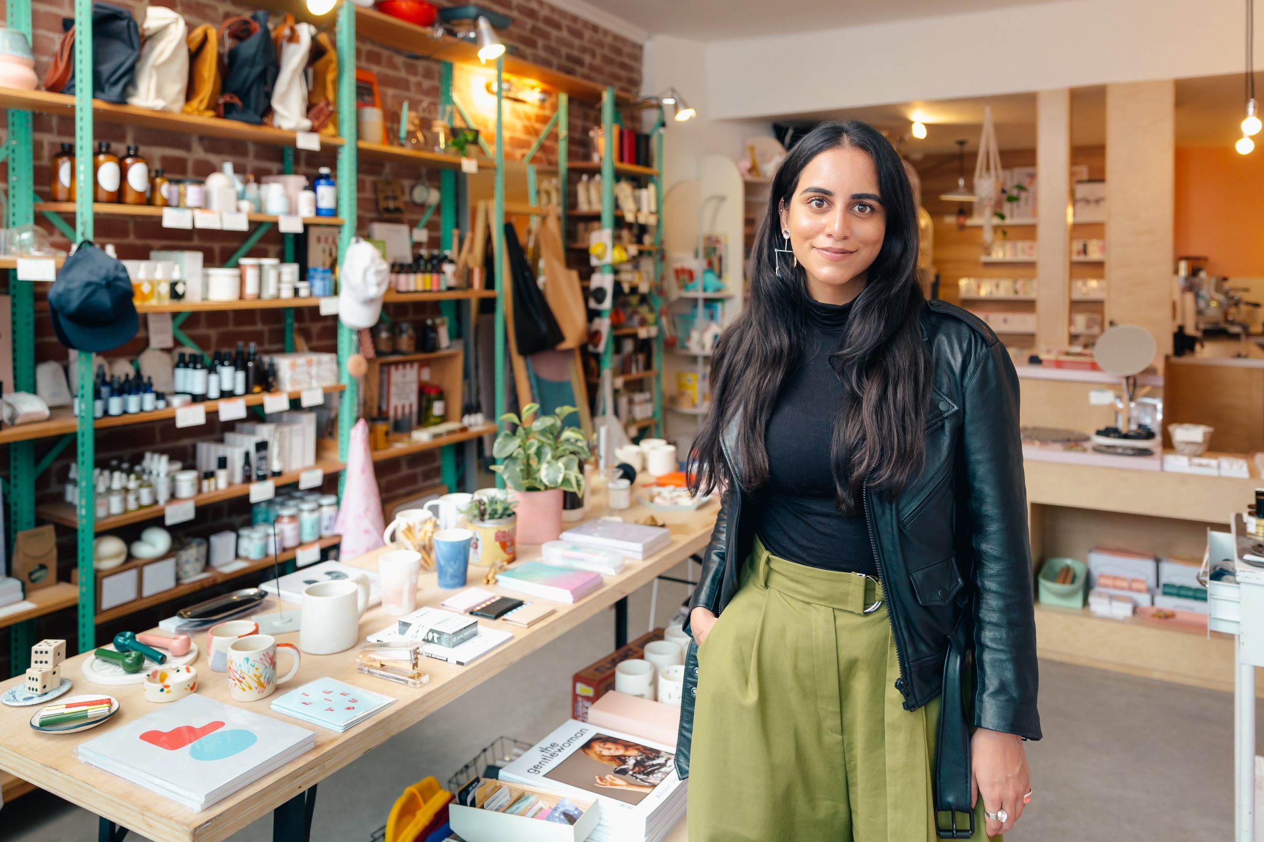 entrepreneur standing in her store 4460×4460 scaled