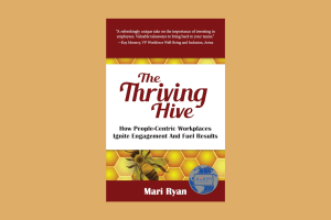 The book cover for The Thriving Hive