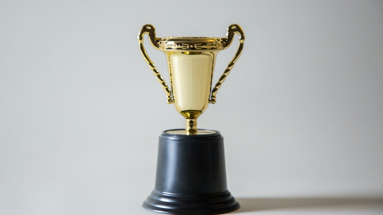 A trophy against a white background, representing awards for women in tech and IT