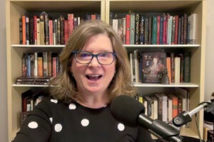 CAL bookshelf and mic 2024 Carol Ann Lloyd Stanger upscaled